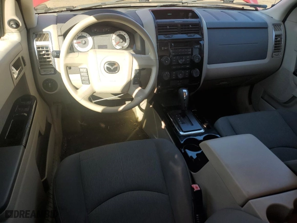 2010 Mazda Tribute Touring with VIN 4F2CY9C77AKM04941, listed as a Copart auction lot 50802955 with 118,480 mi miles and Salvage Title. Bid and sale history available at carsss.com. Image 8.