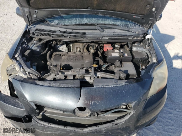 2011 Toyota Yaris with VIN JTDBT4K33B1404938, listed as a Copart auction lot 44312955 with 0 mi miles and Salvage Title. Bid and sale history available at carsss.com. Image 11.