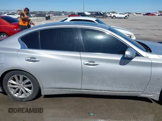 2014 Infiniti Q50 Sport with VIN JN1BV7AR7EM701783, listed as a IAAI auction lot 41757085 with 115,352 mi miles and . Bid and sale history available at DreamBid. Image 13.