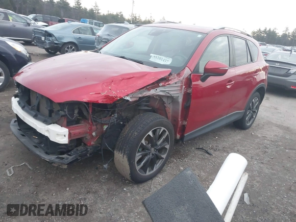 2016 Mazda CX-5 Grand Touring with VIN JM3KE4DY6G0740347, listed as a IAAI auction lot 41101437 with 81,586 mi miles. Bid and sale history available at carsss.com. Image 20.