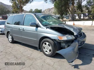 2000 Honda Odyssey EX z VIN 2HKRL1862YH551753, wystawiony jako IAAI lot #42164500 z przebiegiem 107 382 mil mil oraz . Historia ofert i sprzedaży dostępna na DreamBid. Obrazek 1.