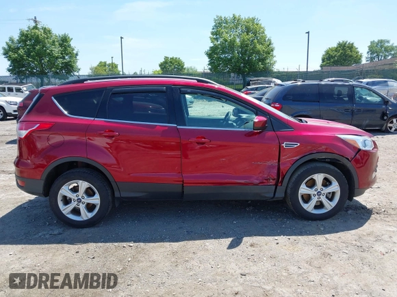 2016 Ford Escape SE z VIN 1FMCU9GX1GUC04815, wystawiony jako IAAI lot #42235499 z przebiegiem 84 713 mil mil oraz . Historia ofert i sprzedaży dostępna na DreamBid. Obrazek 13.