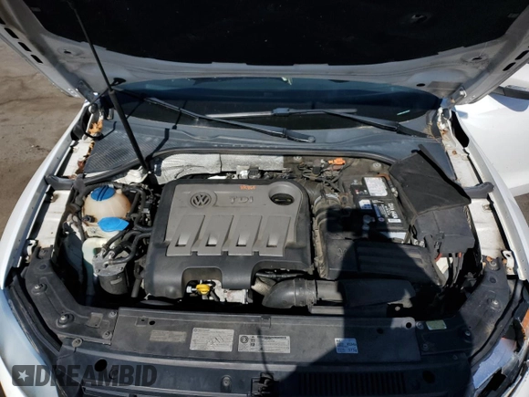 2014 Volkswagen Passat SE z VIN 1VWBN7A30EC022997, wystawiony jako Copart lot #57582285 z przebiegiem 94 920 mil mil oraz Szkoda całkowita • Salvage title. Historia ofert i sprzedaży dostępna na DreamBid. Obrazek 11.