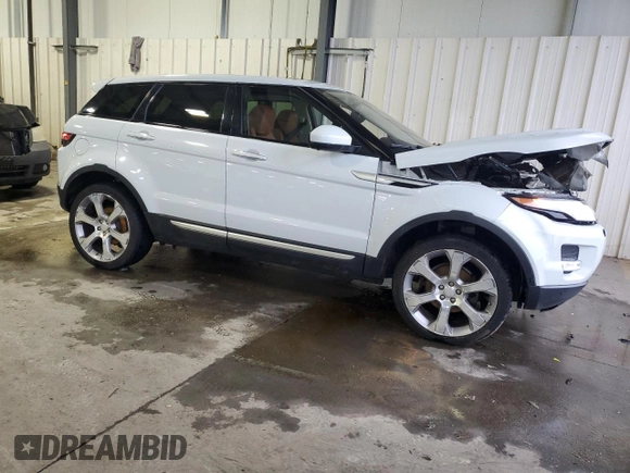 2015 Land Rover Range Rover Evoque Prestige with VIN SALVV2BG2FH036658, listed as a Copart auction lot 86829314 with 104,895 mi miles and Salvage title. Bid and sale history available at DreamBid. Image 4.