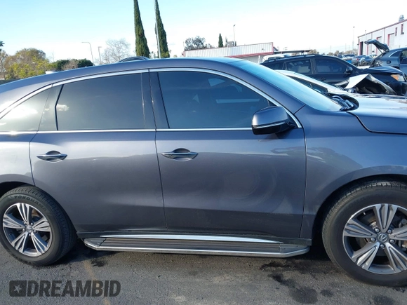 2019 Acura MDX with VIN 5J8YD3H38KL005442, listed as a IAAI auction lot 41542505 with 84,033 mi miles and . Bid and sale history available at DreamBid. Image 13.