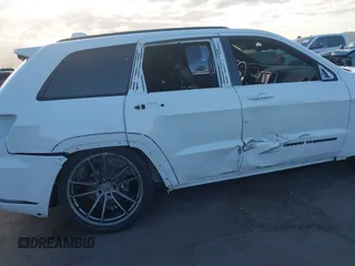2018 Jeep Grand Cherokee Overland z VIN 1C4RJFCG7JC158464, wystawiony jako IAAI lot #42056386 z przebiegiem 94 608 mil mil oraz . Historia ofert i sprzedaży dostępna na DreamBid. Obrazek 18.