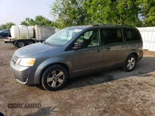 2009 Dodge Grand Caravan SE with VIN 2D8HN44E29R694728, listed as a Copart auction lot 60287565 with 233,018 mi miles and Clean title. Bid and sale history available at DreamBid. Image 1.