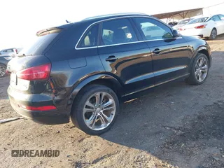 2017 Audi Q3 Premium Plus z VIN WA1JCCFS3HR002400, wystawiony jako IAAI lot #41464520 z przebiegiem 100 560 mil mil oraz . Historia ofert i sprzedaży dostępna na DreamBid. Obrazek 4.