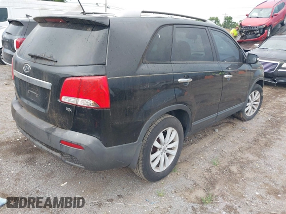 2011 Kia Sorento EX with VIN 5XYKU3A14BG015703, listed as a IAAI auction lot 42607024 with 176,491 mi miles and . Bid and sale history available at DreamBid. Image 4.
