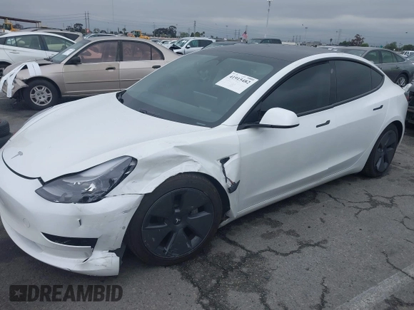 2021 Tesla Model 3 Long Range with VIN 5YJ3E1EB6MF878957, listed as a IAAI auction lot 41915482 with 59,578 mi miles. Bid and sale history available at carsss.com. Image 19.