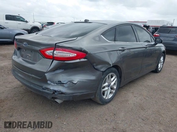 2014 Ford Fusion SE with VIN 1FA6P0H78E5373472, listed as a IAAI auction lot 42100823 with 186,173 mi miles and . Bid and sale history available at DreamBid. Image 4.