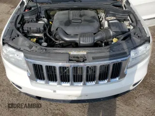 2011 Jeep Grand Cherokee Laredo z VIN 1J4RR4GG1BC506083, wystawiony jako Copart lot #58498295 z przebiegiem 122 847 mil mil oraz Czysty tytuł • Clean title. Historia ofert i sprzedaży dostępna na DreamBid. Obrazek 12.