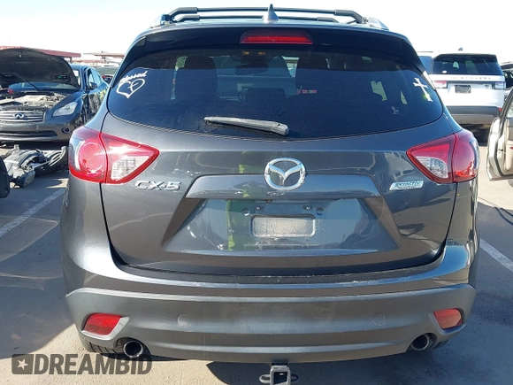 2016 Mazda CX-5 Touring with VIN JM3KE2CY4G0695947, listed as a IAAI auction lot 41824490 with 162,191 mi miles and . Bid and sale history available at carsss.com. Image 17.