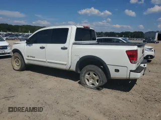 2015 Nissan Titan SL with VIN 1N6BA0EC7FN503784, listed as a Copart auction lot 68442114 with 130,651 mi miles and Salvage Title. Bid and sale history available at carsss.com. Image 2.