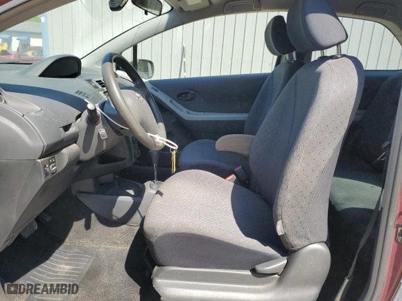 2009 Toyota Yaris with VIN JTDJT903695246609, listed as a Copart auction lot 52913055 with 234,331 mi miles and Clean Title. Bid and sale history available at carsss.com. Image 7.