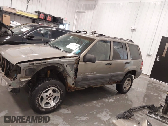 1997 Jeep Grand Cherokee Laredo with VIN 1J4GZ58S2VC746778, listed as a IAAI auction lot 41225925 with 196,679 mi miles. Bid and sale history available at carsss.com. Image 15.