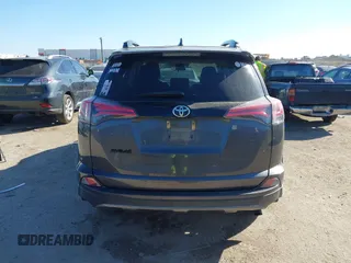 2018 Toyota RAV4 XLE with VIN 2T3WFREV0JW451962, listed as a IAAI auction lot 41670185 with 75,718 mi miles. Bid and sale history available at carsss.com. Image 16.
