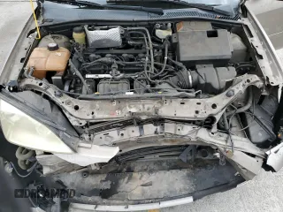 2005 Ford Focus S with VIN 1FAFP34N55W105530, listed as a Copart auction lot 59186695 with 136,204 mi miles and Salvage title. Bid and sale history available at DreamBid. Image 11.