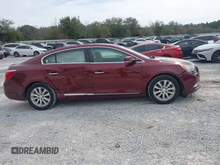 2015 Buick LaCrosse Leather with VIN 1G4GB5GR1FF296173, listed as a IAAI auction lot 41611401 with 56,673 mi miles and . Bid and sale history available at DreamBid. Image 13.