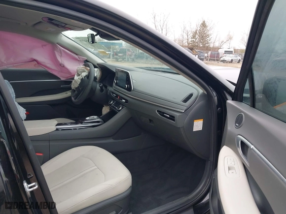 2022 Hyundai Sonata Hybrid SEL with VIN KMHL34JJ6NA050692, listed as a IAAI auction lot 42004770 with 62,514 mi miles. Bid and sale history available at carsss.com. Image 5.