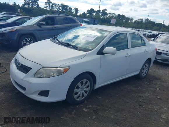 2009 Toyota Corolla with VIN JTDBL40E199019510, listed as a IAAI auction lot 40471286 with 99,818 mi miles and . Bid and sale history available at carsss.com. Image 2.