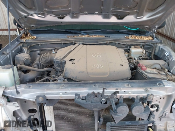 2014 Toyota Tacoma with VIN 3TMLU4EN3EM162738, listed as a IAAI auction lot 41871226 with 135,318 mi miles and . Bid and sale history available at DreamBid. Image 10.