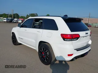 2016 Jeep Grand Cherokee SRT with VIN 1C4RJFDJ3GC503878, listed as a IAAI auction lot 42830257 with 82,661 mi miles and . Bid and sale history available at DreamBid. Image 3.