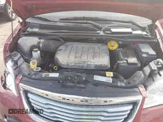 2014 Chrysler Town & Country Touring with VIN 2C4RC1BG9ER418147, listed as a IAAI auction lot 41812594 with 161,356 mi miles and . Bid and sale history available at DreamBid. Image 10.