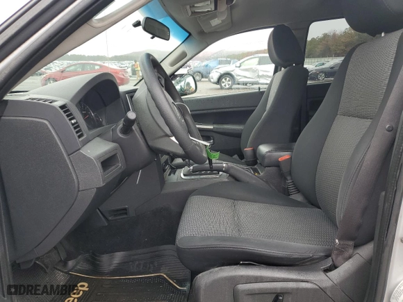 2009 Jeep Grand Cherokee Laredo with VIN 1J8GS48K49C535701, listed as a Copart auction lot 44306675 with 306,585 mi miles and Salvage Title. Bid and sale history available at carsss.com. Image 7.