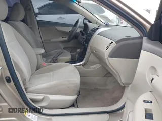 2009 Toyota Corolla with VIN 1NXBU40E99Z118081, listed as a IAAI auction lot 42086882 with 199,328 mi miles and . Bid and sale history available at DreamBid. Image 5.