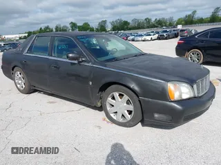 2002 Cadillac DeVille DHS z VIN 1G6KE57Y62U233642, wystawiony jako IAAI lot #42132517 z przebiegiem 223 505 mil mil oraz . Historia ofert i sprzedaży dostępna na DreamBid. Obrazek 1.