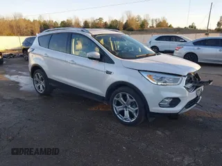 2017 Ford Escape Titanium with VIN 1FMCU0J98HUA75690, listed as a IAAI auction lot 41358534 with 90,376 mi miles. Bid and sale history available at carsss.com. Image 1.