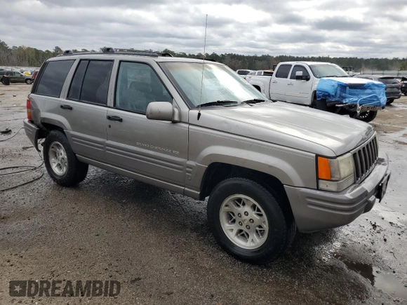 1997 Jeep Grand Cherokee Limited with VIN 1J4GZ78Y0VC682949, listed as a Copart auction lot 82152424 with 194,576 mi miles and Salvage Title. Bid and sale history available at carsss.com. Image 4.
