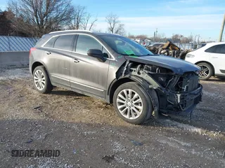 2017 Cadillac XT5 Platinum AWD with VIN 1GYKNFRS4HZ132407, listed as a IAAI auction lot 41441044 with 154,215 mi miles. Bid and sale history available at carsss.com. Image 1.