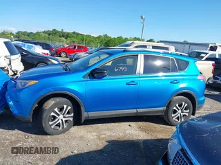 2016 Toyota RAV4 LE with VIN JTMBFREV2GD183811, listed as a IAAI auction lot 42216793 with 95,270 mi miles and . Bid and sale history available at DreamBid. Image 14.