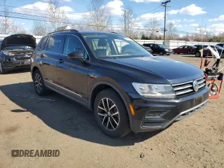 2021 Volkswagen Tiguan SE with VIN 3VV3B7AX3MM042775, listed as a Copart auction lot 50608595 with 89,480 mi miles and Salvage Title. Bid and sale history available at DreamBid. Image 4.