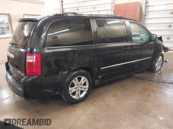 2010 Dodge Grand Caravan Crew with VIN 2D4RN6DX8AR431232, listed as a IAAI auction lot 41684591 with 142,713 mi miles and . Bid and sale history available at DreamBid. Image 4.