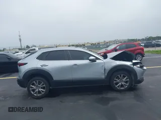 2021 Mazda CX-30 Select with VIN 3MVDMBBLXMM246600, listed as a IAAI auction lot 42418629 with 77,713 mi miles and . Bid and sale history available at DreamBid. Image 12.