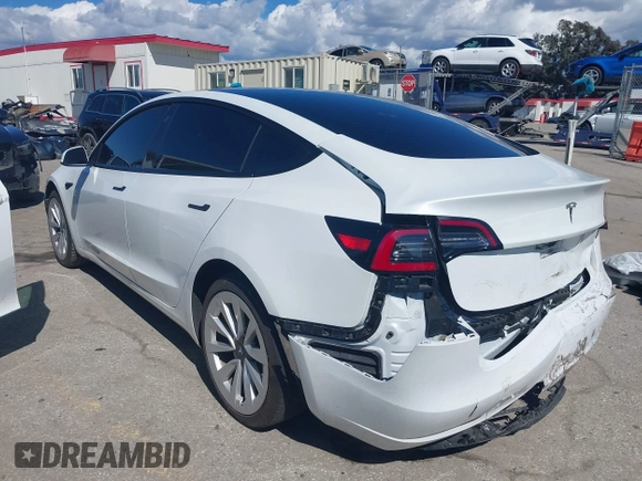 2023 Tesla Model 3 z VIN 5YJ3E1EA3PF451392, wystawiony jako IAAI lot #41668299 z przebiegiem 77 915 mil mil oraz . Historia ofert i sprzedaży dostępna na DreamBid. Obrazek 3.