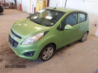2014 Chevrolet Spark LS with VIN KL8CB6S9XEC517472, listed as a IAAI auction lot 41696825 with 154,197 mi miles. Bid and sale history available at carsss.com. Image 2.