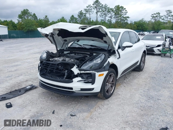 2021 Porsche Macan with VIN WP1AA2A52MLB06086, listed as a IAAI auction lot 39423611 with 56,559 mi miles and . Bid and sale history available at DreamBid. Image 17.