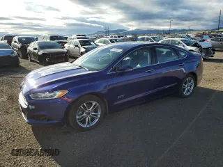 2015 Ford Fusion Energi Titanium with VIN 3FA6P0SU5FR173632, listed as a Copart auction lot 55838024 with 74,651 mi miles and Salvage Title. Bid and sale history available at carsss.com. Image 1.
