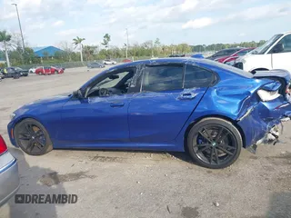 2020 BMW 3 Series M340i xDrive with VIN WBA5U9C00LA379345, listed as a IAAI auction lot 41256225 with 57,856 mi miles and . Bid and sale history available at DreamBid. Image 14.
