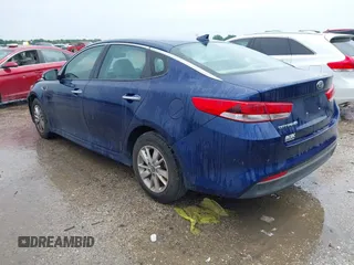 2016 Kia Optima LX with VIN 5XXGT4L34GG083587, listed as a IAAI auction lot 42273240 with 87,286 mi miles and . Bid and sale history available at DreamBid. Image 3.