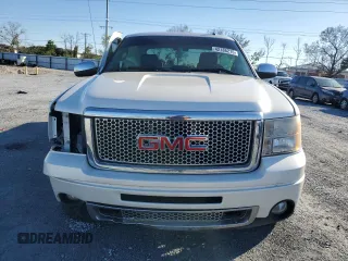 2011 GMC Sierra 1500 Denali z VIN 3GTP2XE26BG222472, wystawiony jako Copart lot #42186215 z przebiegiem Nie podano mil oraz Nie do naprawy • Non repairable. Historia ofert i sprzedaży dostępna na DreamBid. Obrazek 5.