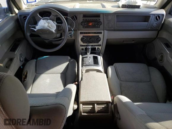 2006 Jeep Commander with VIN 1J8HH48K26C263986, listed as a Copart auction lot 84712294 with 216,923 mi miles and Salvage title. Bid and sale history available at DreamBid. Image 8.