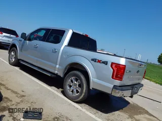 2015 Ford F-150 XLT with VIN 1FTEW1EG8FKE61864, listed as a IAAI auction lot 42120436 with 129,448 mi miles and . Bid and sale history available at DreamBid. Image 3.