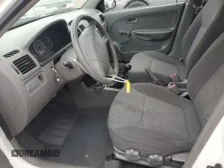 2003 Kia Rio with VIN KNADC125136274488, listed as a Copart auction lot 79561204 with 117,608 mi miles and Salvage Title. Bid and sale history available at carsss.com. Image 7.