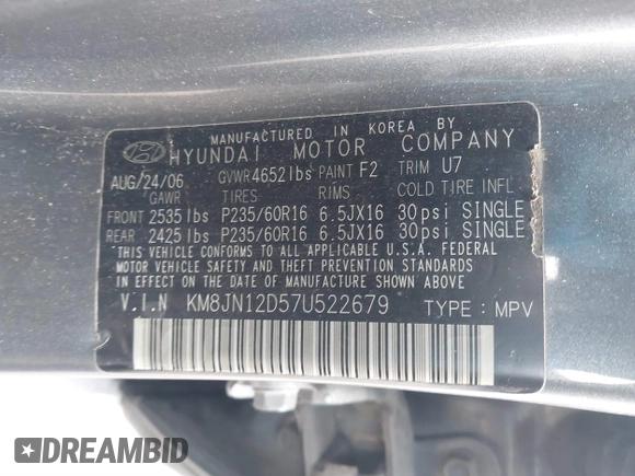2007 Hyundai Tucson SE with VIN KM8JN12D57U522679, listed as a IAAI auction lot 41891506 with 223,190 mi miles. Bid and sale history available at carsss.com. Image 9.