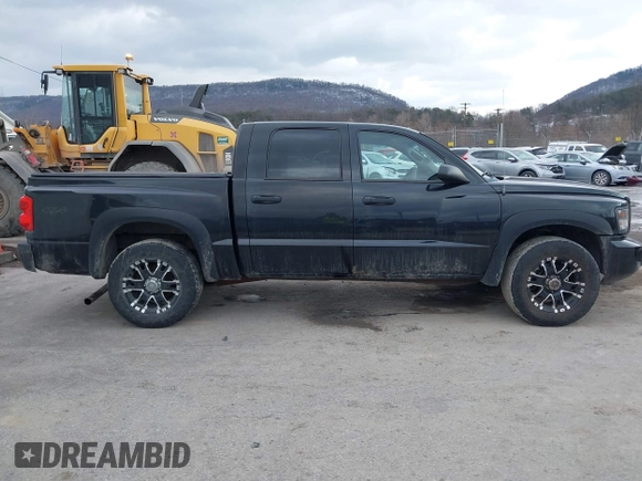 2011 Ram Dakota Bighorn/Lonestar with VIN 1D7RW3GK6BS611095, listed as a IAAI auction lot 41433067 with 137,638 mi miles. Bid and sale history available at carsss.com. Image 13.